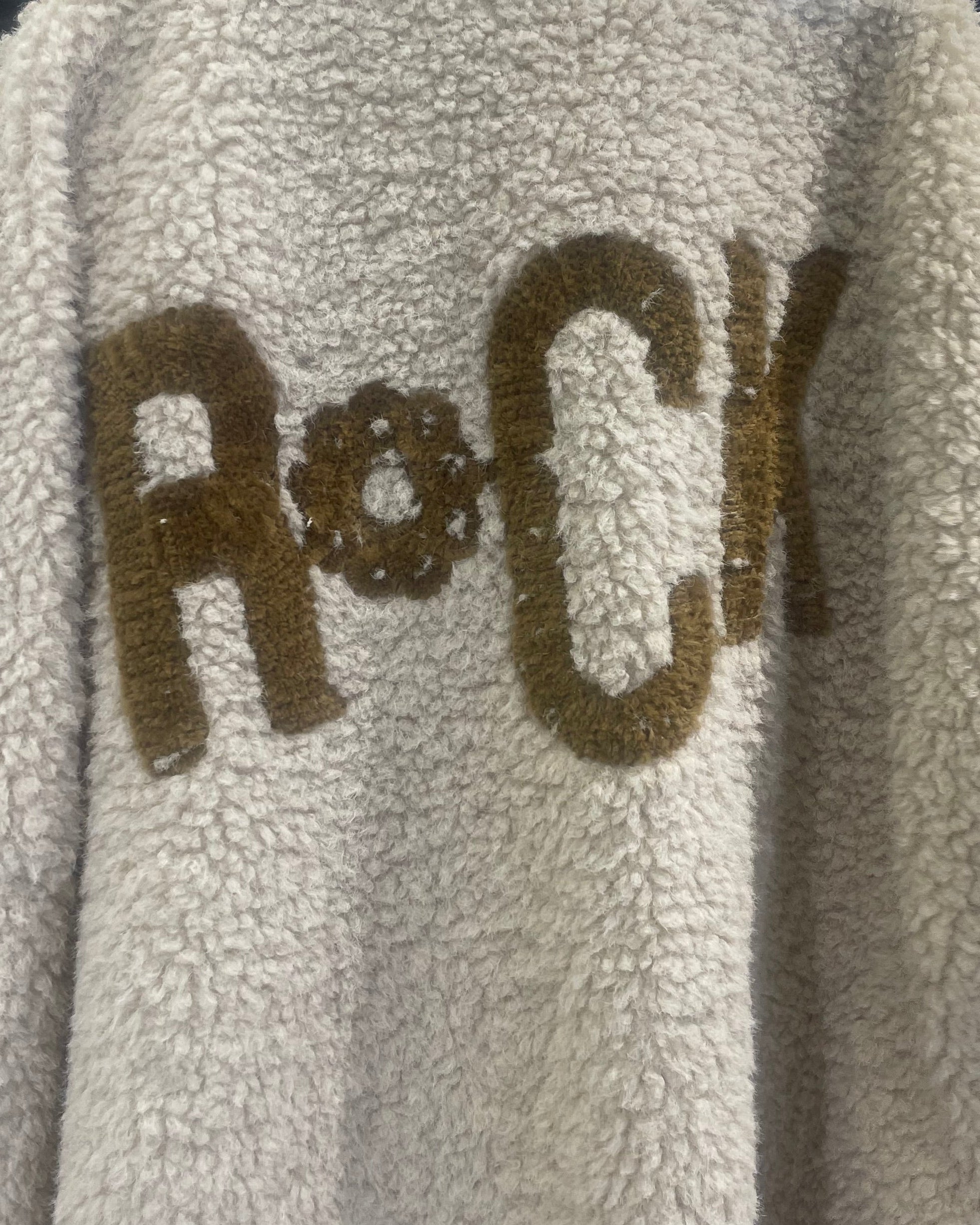 Détail dos du manteau Louna Rock avec inscription ROCK dorée