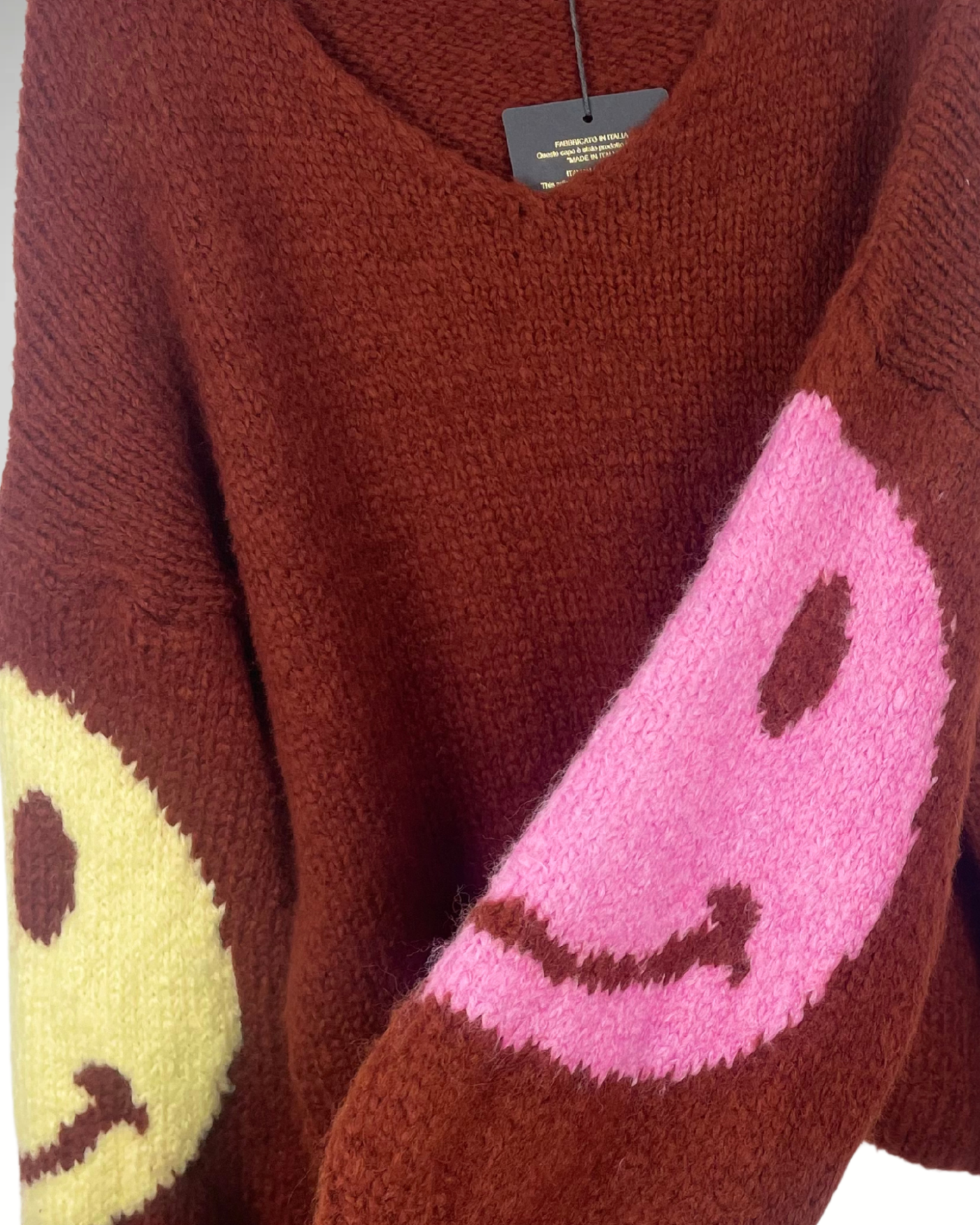 Détail smiley rose sur manche – Mam’sailes