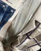 Détail double boutonnage manteau surchemise carreaux polyester recyclé