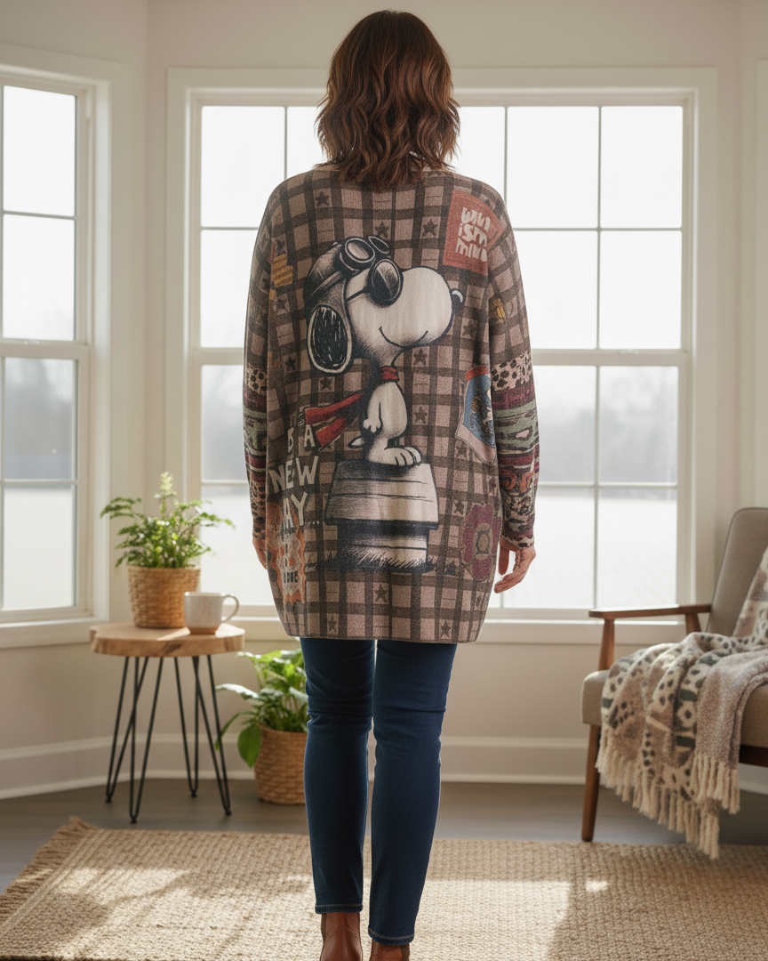 Vue de dos du pull oversize Snoopy avec imprimé rétro et maille douce.