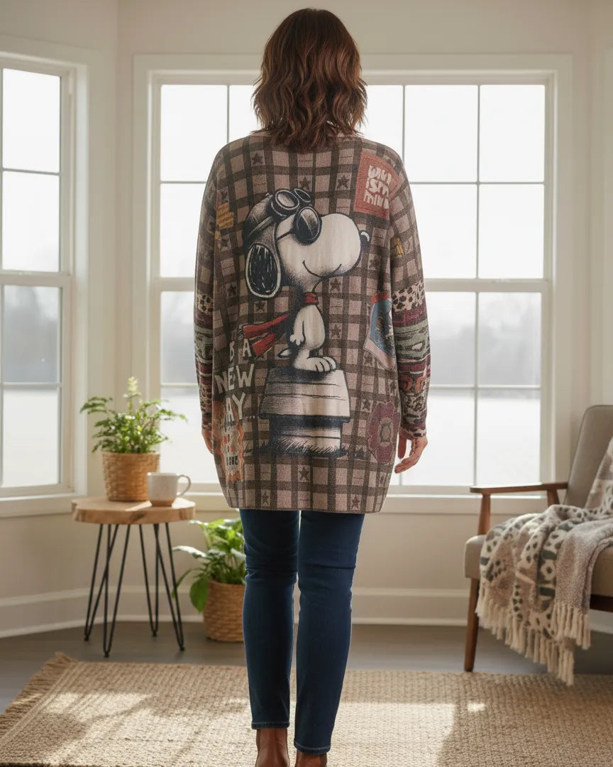 Vue de dos du pull oversize Snoopy avec imprimé rétro et maille douce.