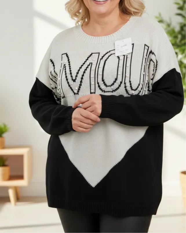 Pull noir et crème doux avec perles nacrées, coupe droite cocooning chic