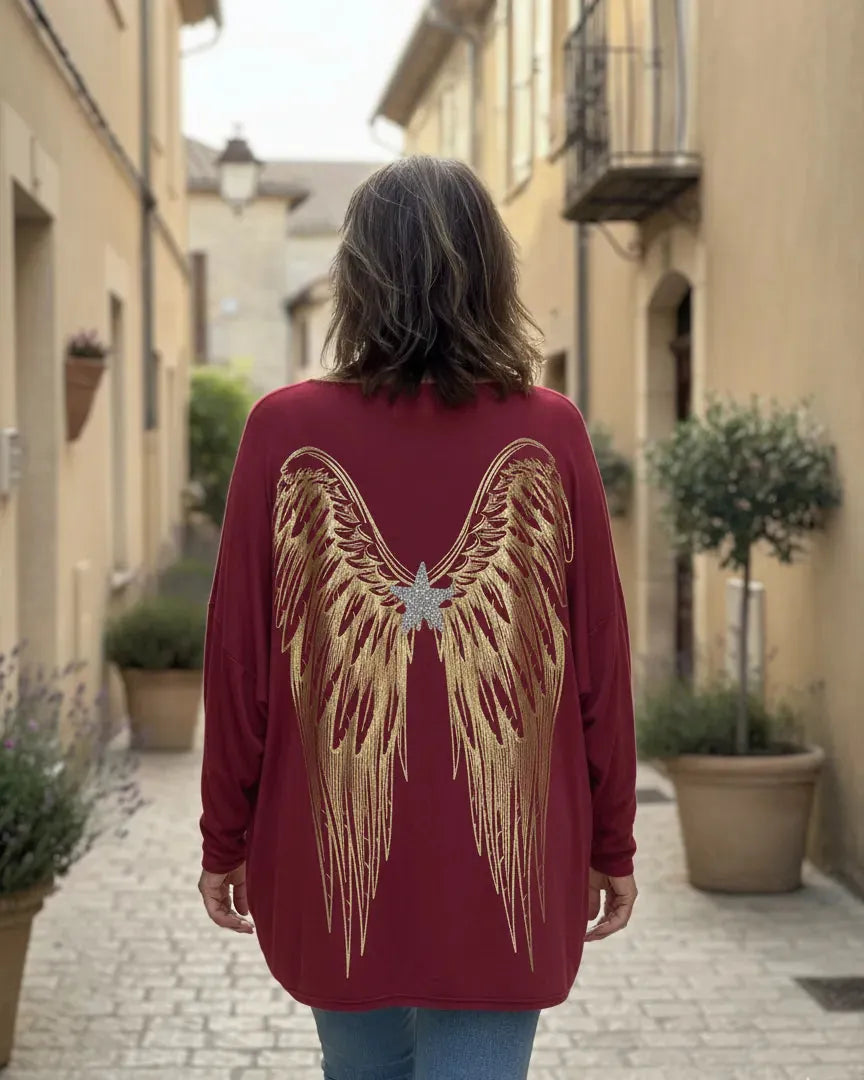 Pull femme oversize bordeaux orné d’ailes dorées