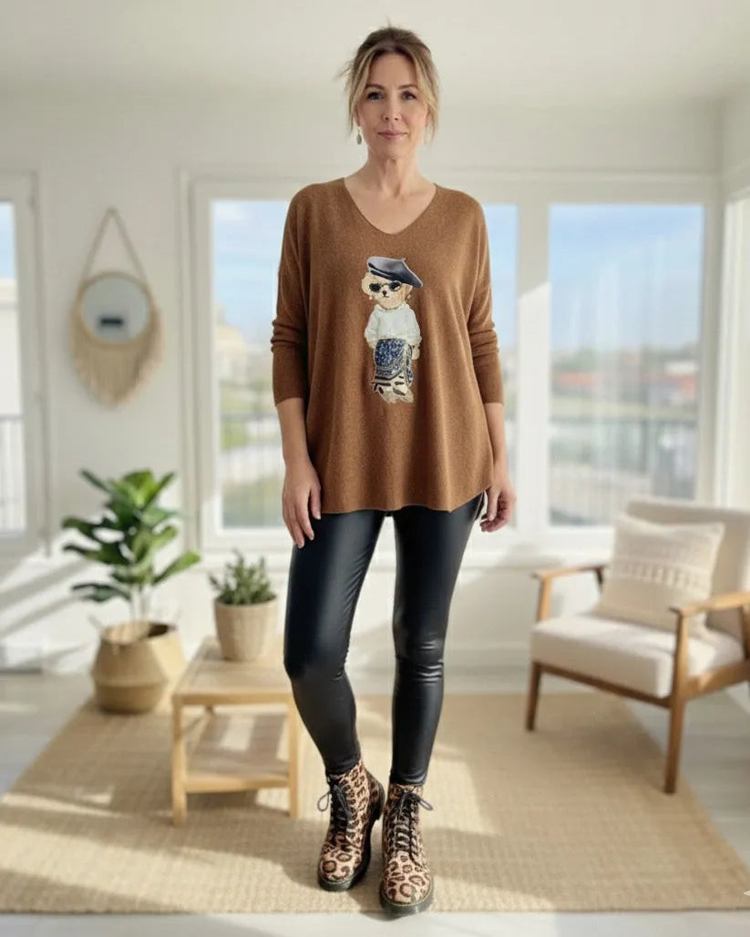 Legging simili noir pour femme, taille haute effet gainant, coupe ajustée et confortable.