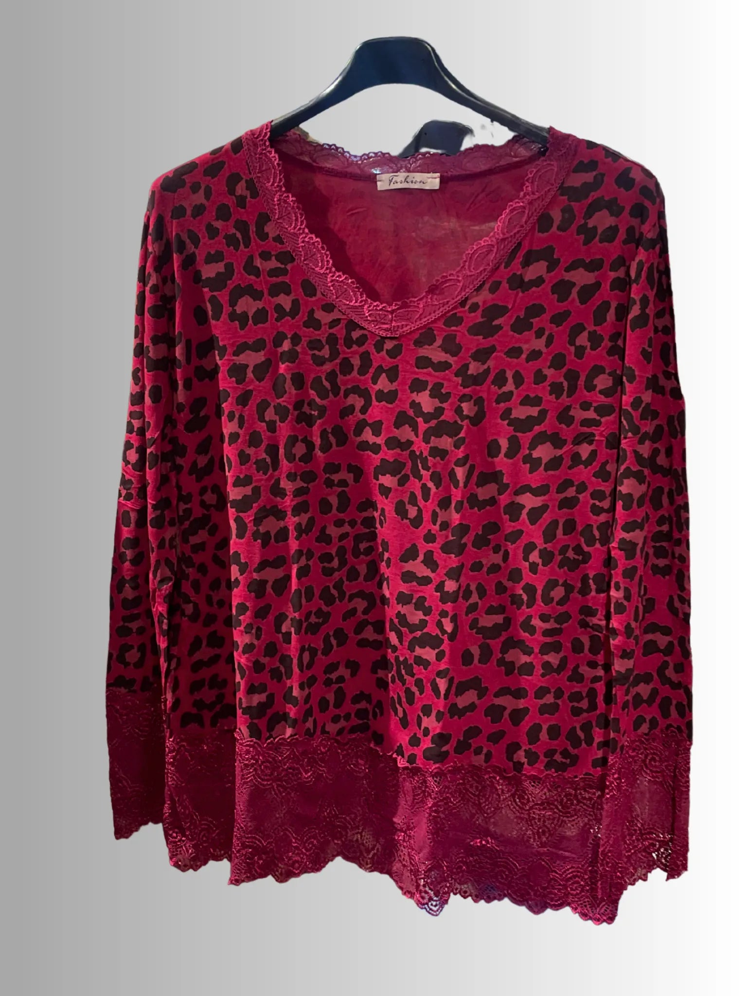 Haut "Rouleaux Dentelle" imprimé léopard — Élégance sauvage