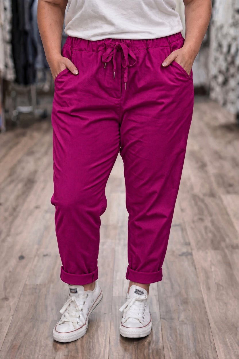 Pantalon élastique appelle magique de couleur framboise intense