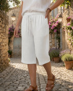 Bermuda gaze de coton blanc femme, coupe fluide taille élastique, style estival épuré et bohème