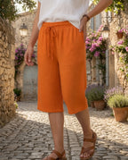 Bermuda gaze de coton orange à cordon et poches latérales, silhouette colorée et décontractée pour l'été