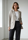 Blazer beige made in Italy avec bouton  et fausses poches.