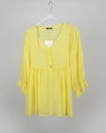 Blouse empire jaune Mam's Ailes sur cintre vue de face boutonnage central manches évasées