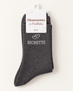 Chaussettes pailletées Bichette gris charbon avec motif cœur sur fond ivoire