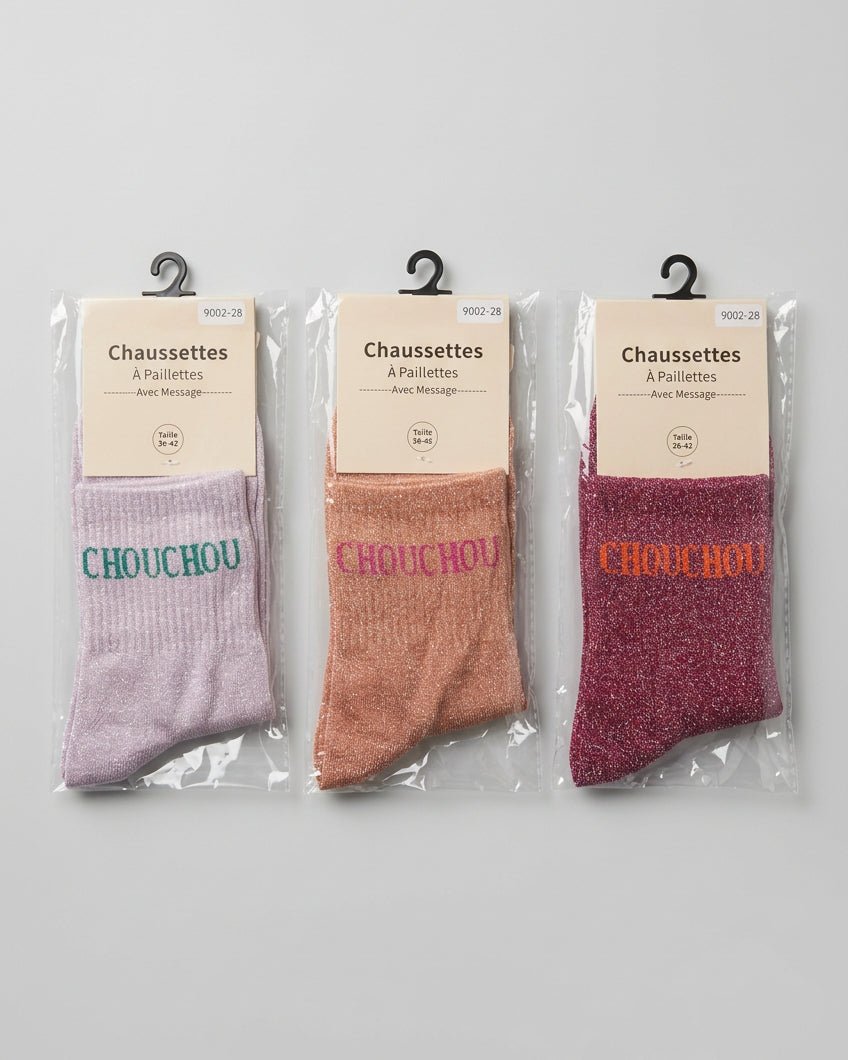 Chaussettes CHOUCHOU rose nude, terracotta et bordeaux présentées dans leurs emballages.