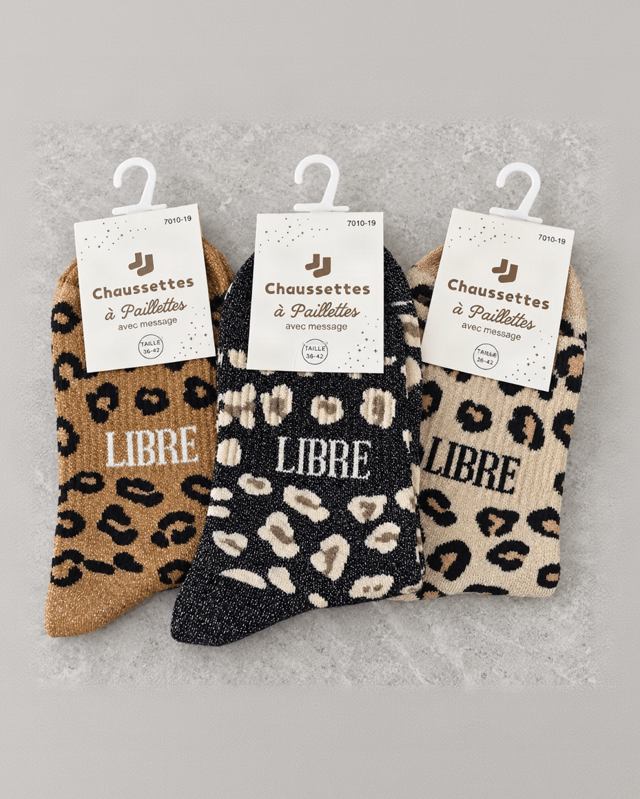 Chaussettes léopard Libre camel, noir et beige, pliées sous leurs cartons