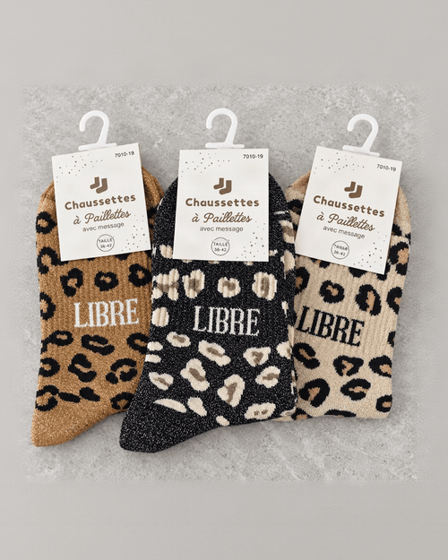 Chaussettes léopard Libre camel, noir et beige, pliées sous leurs cartons