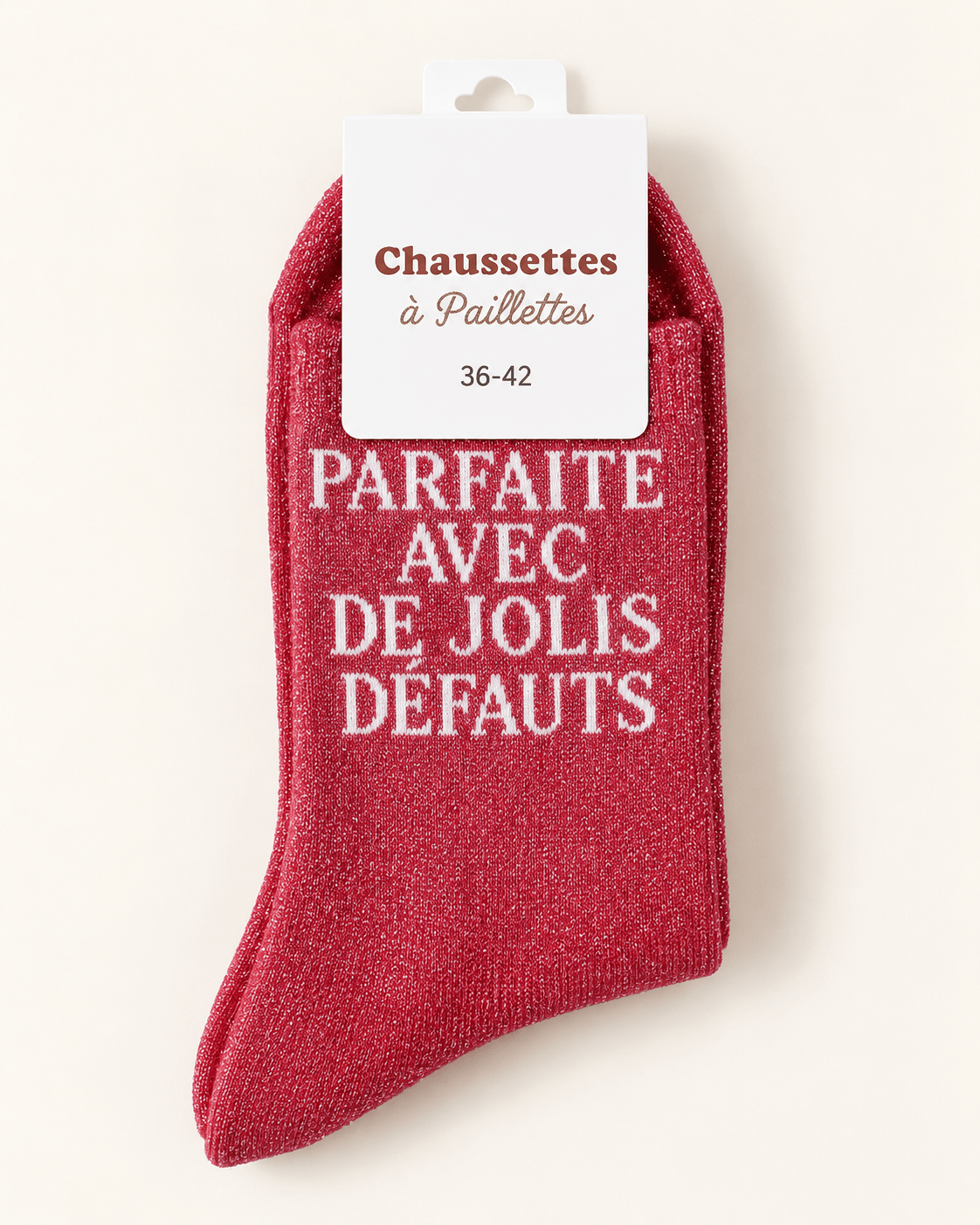 Chaussettes pailletées rouges Parfaite avec de jolis défauts, vue produit sur fond ivoire