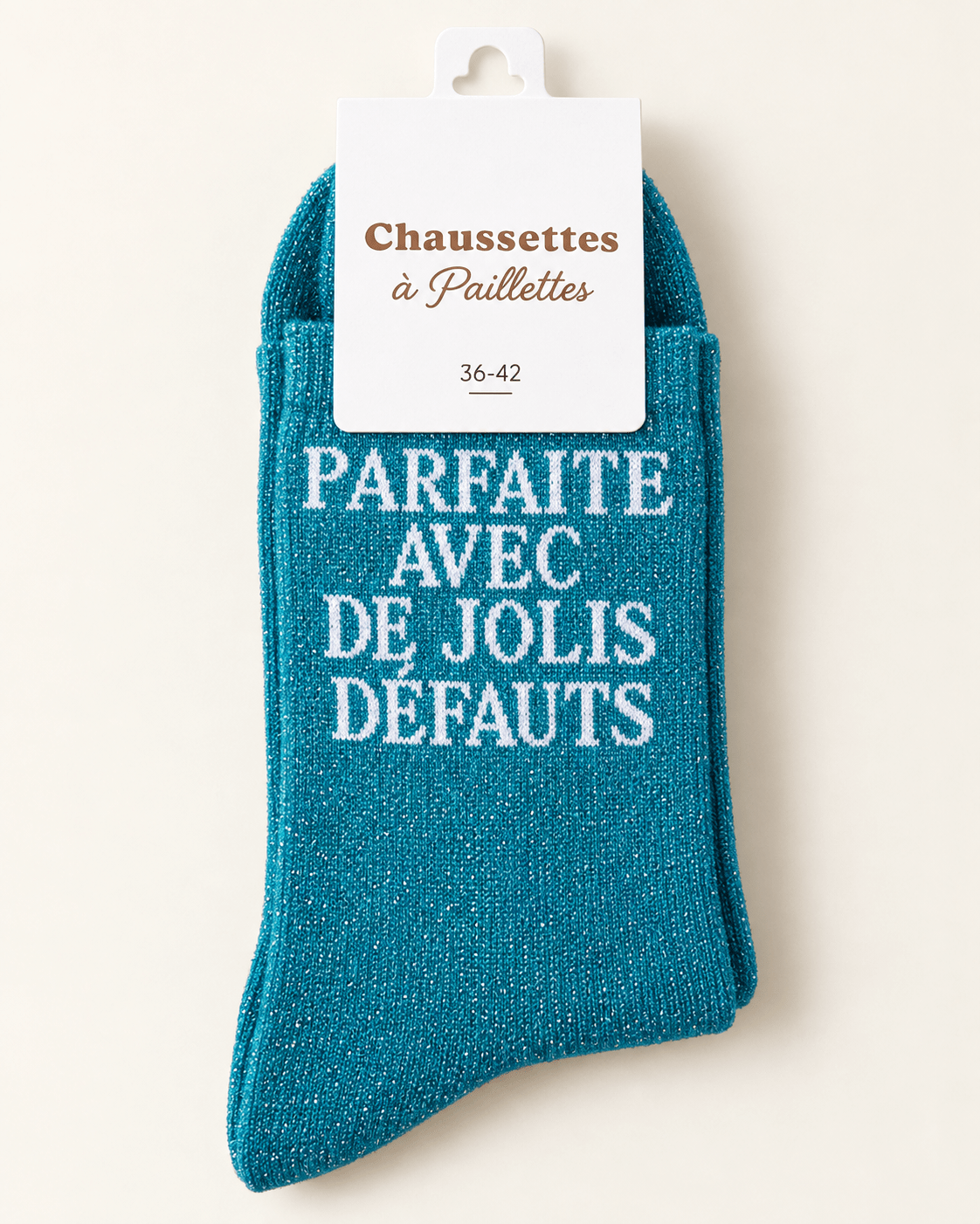 Chaussettes pailletées turquoise foncé Parfaite avec de jolis défauts sur fond ivoire