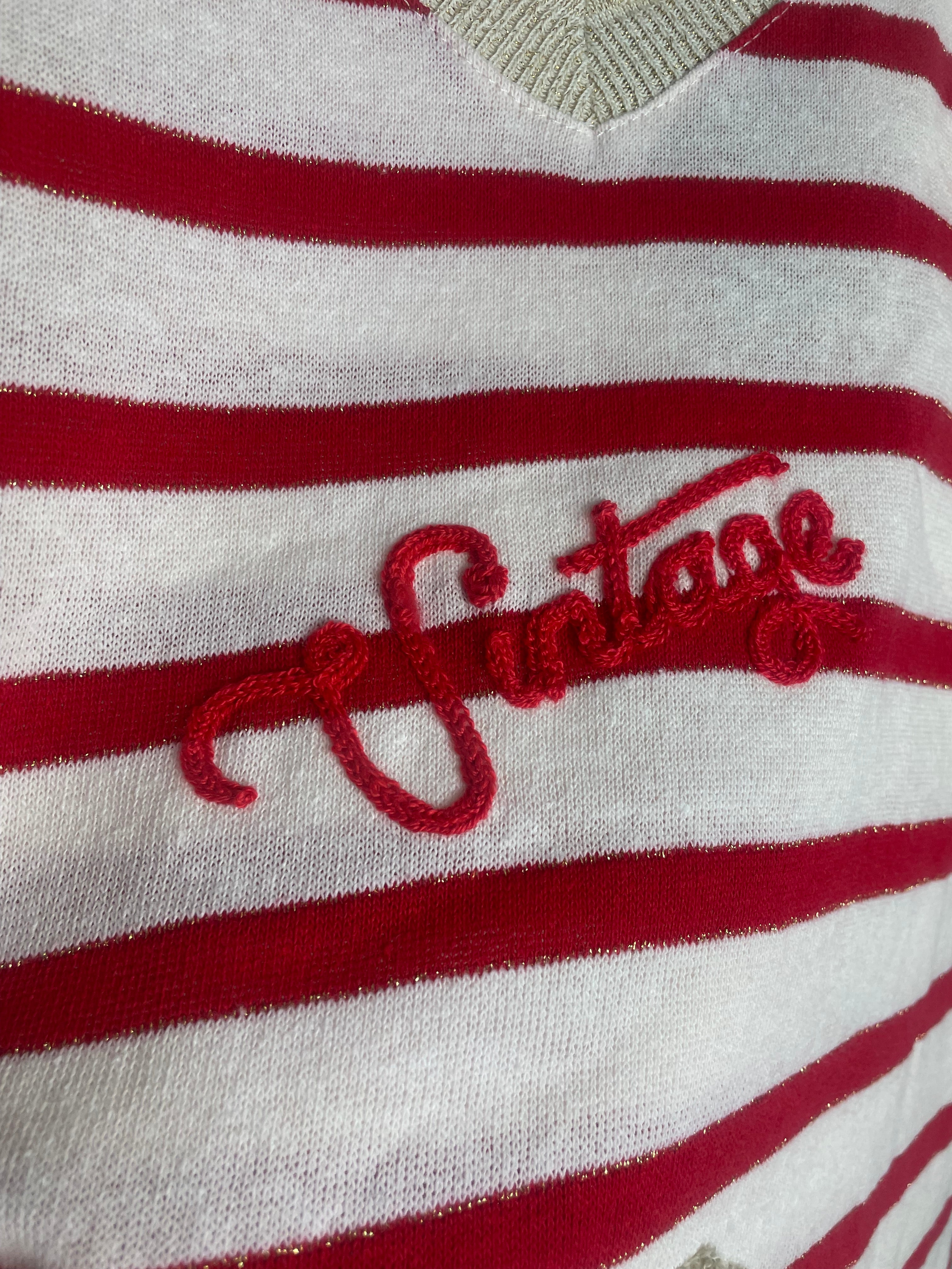 Détail vintage brodé sur le pull Vintia femme à rayures