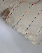 Détail de la matière lin et coton de l’ensemble Livia