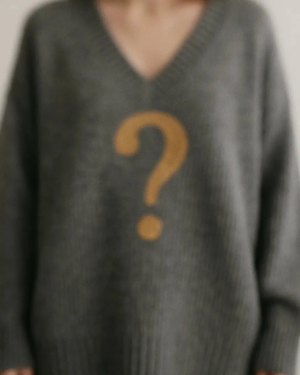 Exemple de pull doré pouvant illustrer le concept Pull Mystère Mam’s Ailes