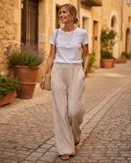 Pantalon Alba écru en coton brodé présenté porté