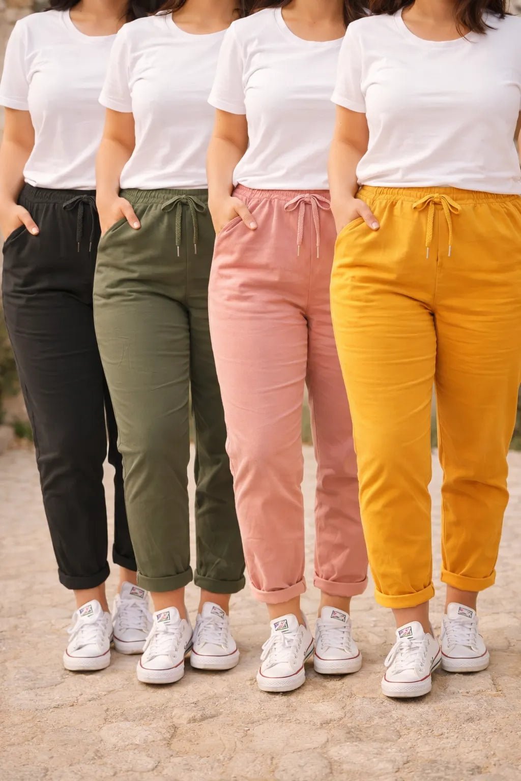 Quatre Pantalons Magiques femme noir, kaki, rose et jaune, coupe fluide à taille élastique