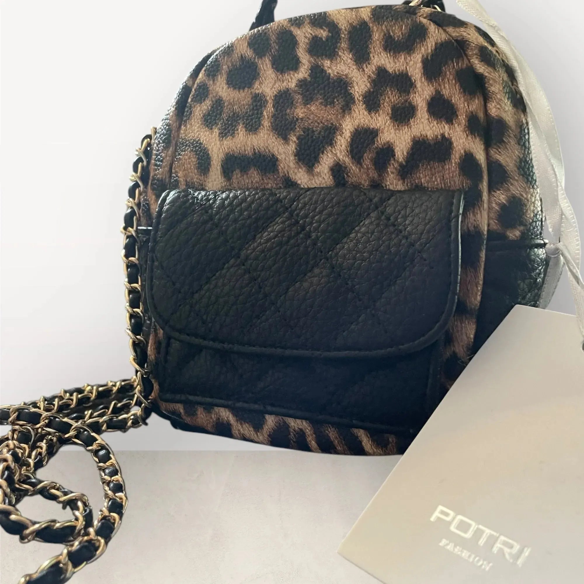 Petit sac à dos noir et léopard – Style & Praticité - Mam’s Ailes