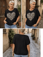 Pull Cuore noir à cœur léopard et strass porté par une femme, vues de face, trois quarts et dos