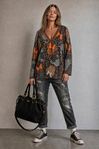 Pull Minnie vue porté avec jean noir et sac Torrente Mamsailes 