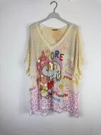 Pull Snoopy Hope ajouré et pailleté, vue de face sur cintre