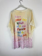 Pull ajouré pailleté femme Snoopy Hope dos avec motif Snoopy coloré et col V dentelle.