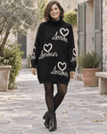 Robe-pull Amour noire en silhouette entière avec collants et bottines
