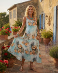 Robe longue Frida Azura femme imprimé bleu aqua avec fleurs et portrait artistique, vue de face, fluide