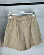 Short bohème femme beige rayé, taille élastiquée et coupe ample légère, vue de dos