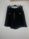 Short femme Made in Italy en polyester viscose et élasthanne, sur cintre