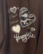 detail motif Sweat capuche oversize 