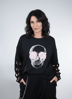 Sweat noir à motif crâne fleuri et manches découpées