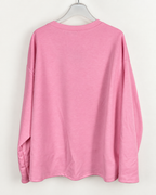 Photo boutique retouchée du dos uni du sweat Instable rose, manches longues et ourlet droit.