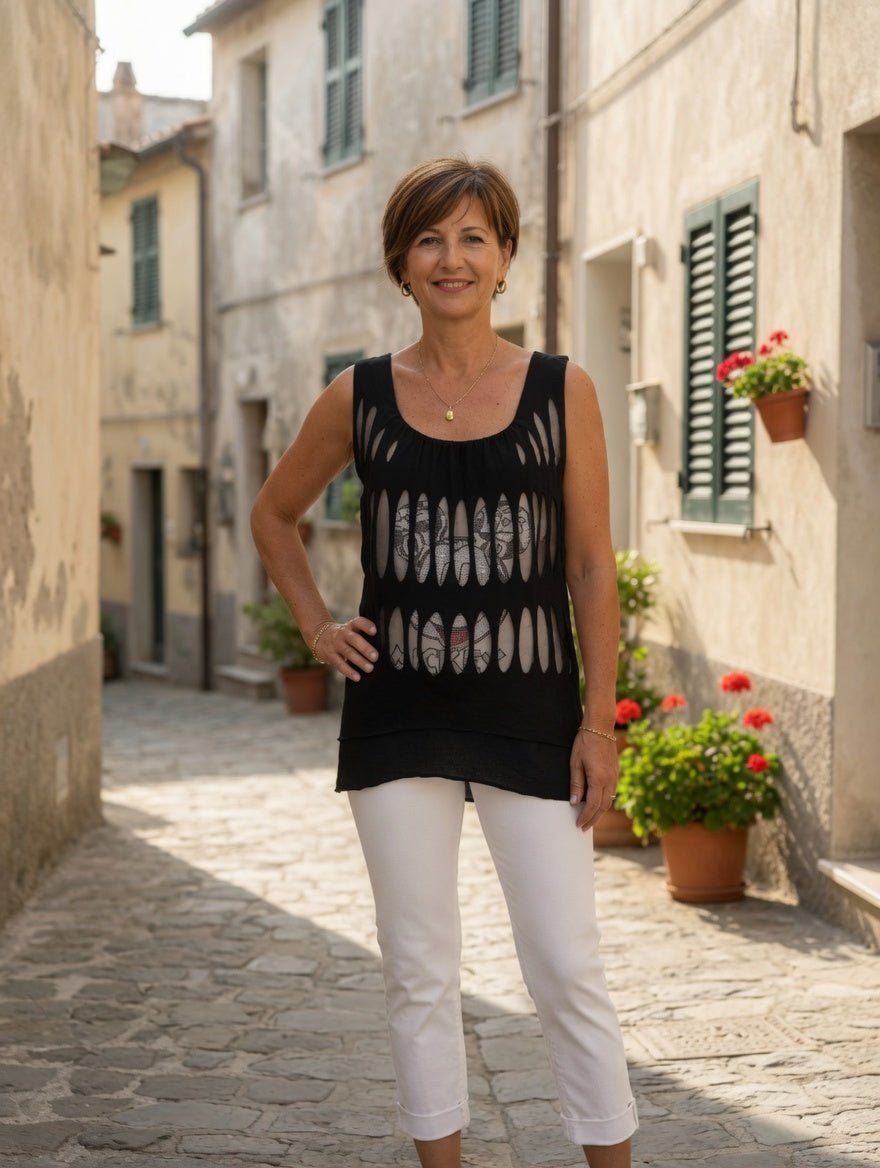 Tunique noire femme avec motif cartoon strass et coupe longue au dos