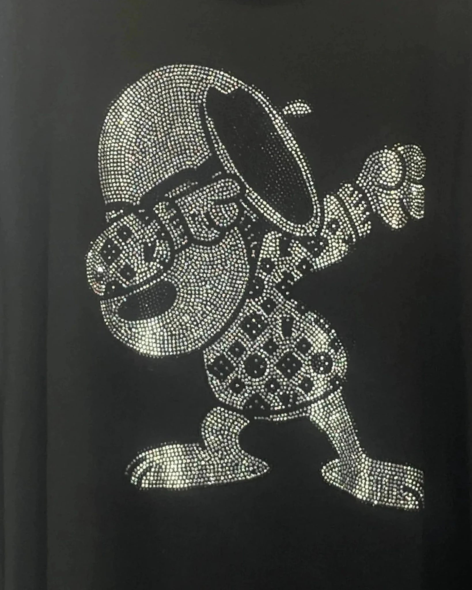 Détail Snoopy dab strass au dos veste, motif fun original
